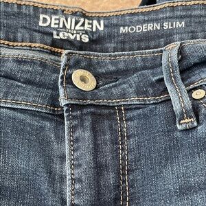 Denizen from Levi's Men's Slim Jeans in Indigo Blue with Tan Stitching